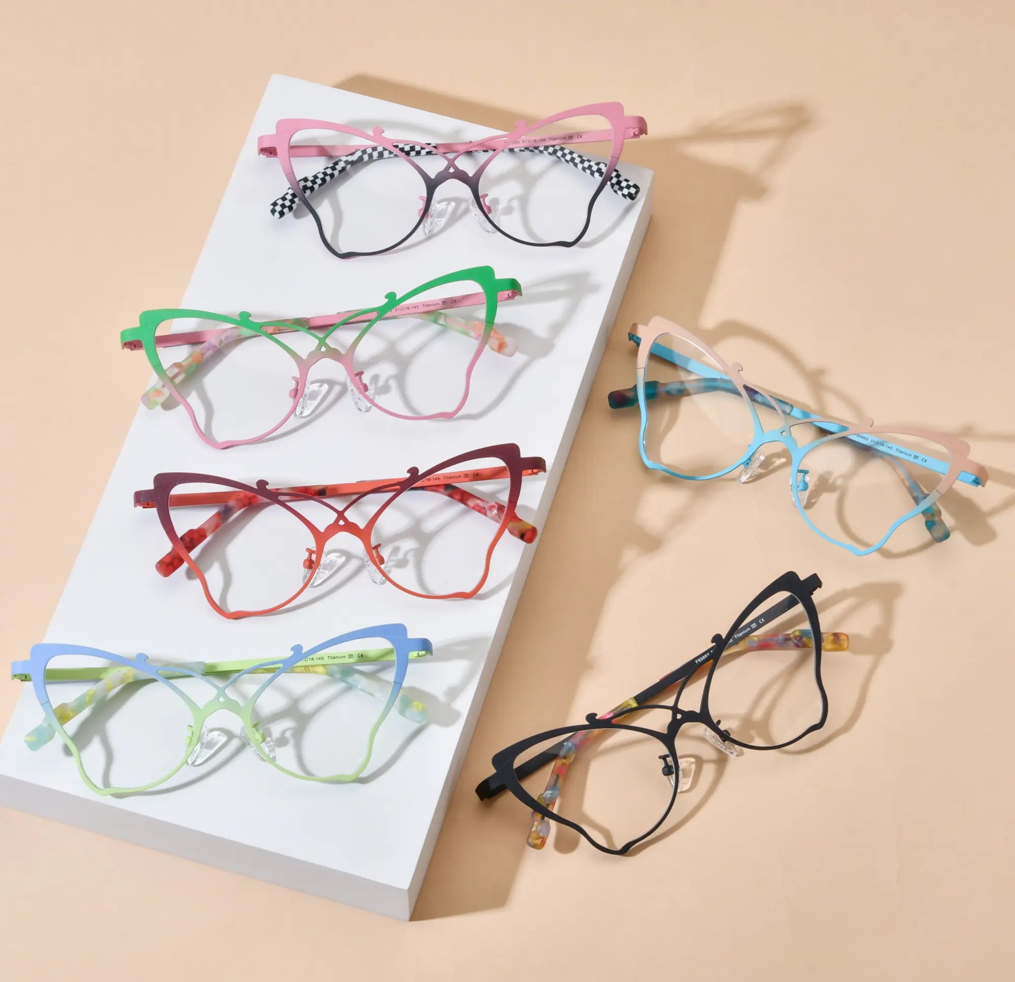 Group display of all six VoyueLens™ VL185862 butterfly frames – lightweight, titanium, vintage-inspired, prescription-ready eyeglasses with colorful artistic style in one image.